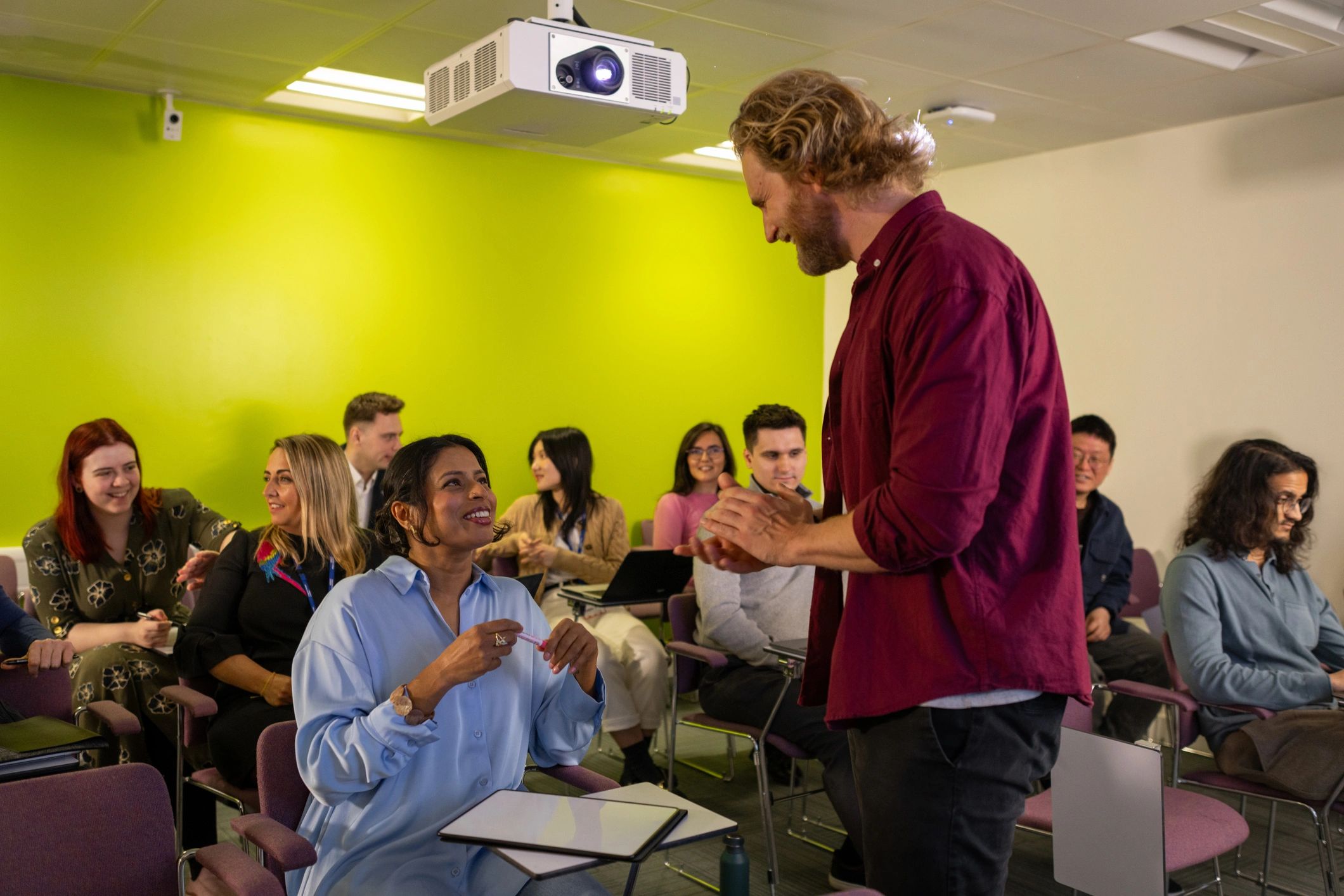 Professionals participating in an online training seminar