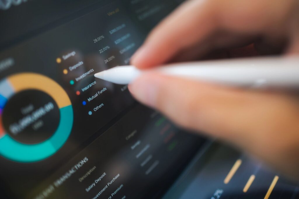 Wide shot finger business women hand integrated fintech on tablet apply information to AI intelligent app budget plan diversify her fund with mobile application investment